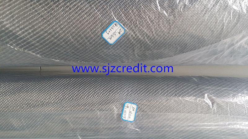 Metallic fiber woven mat